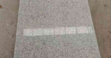 镇江芝麻白光面毛板