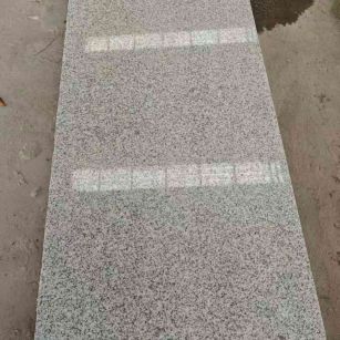 镇江芝麻白光面毛板