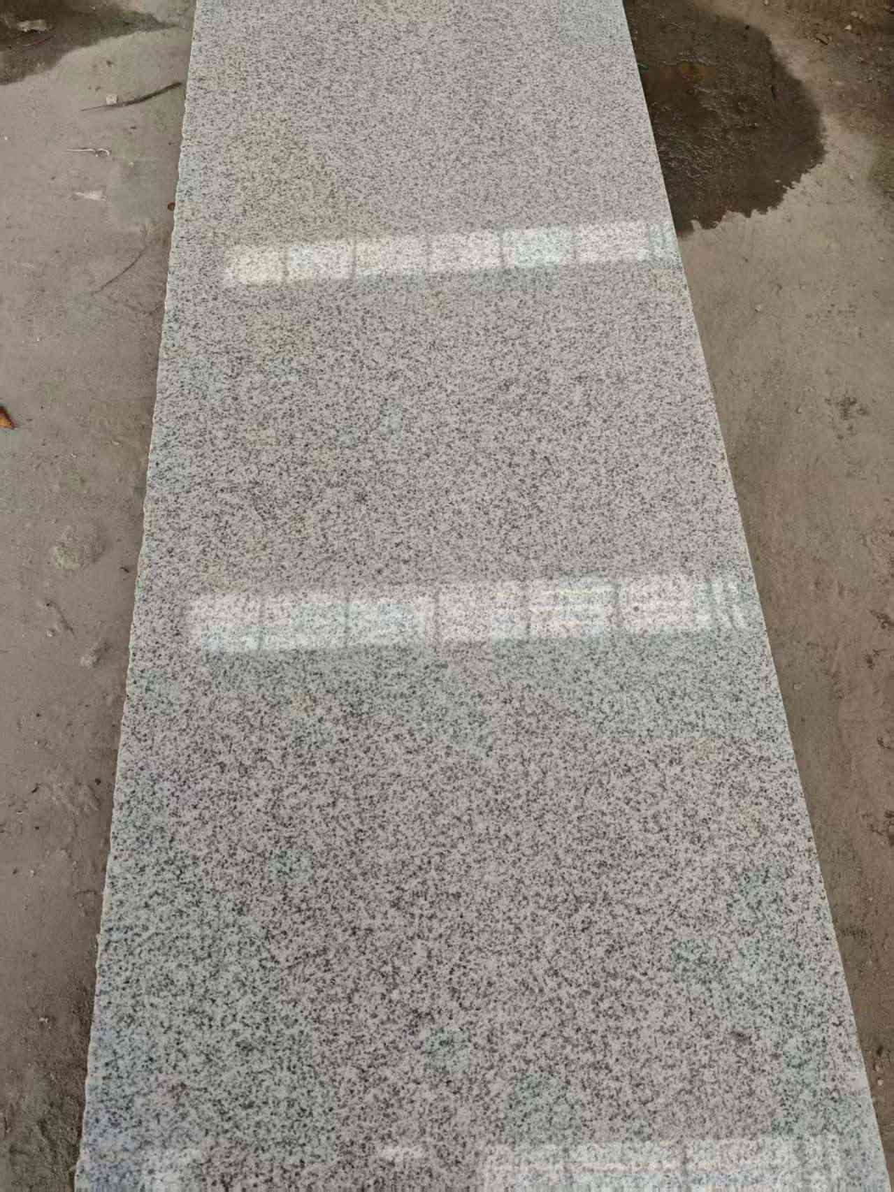 镇江芝麻白光面毛板